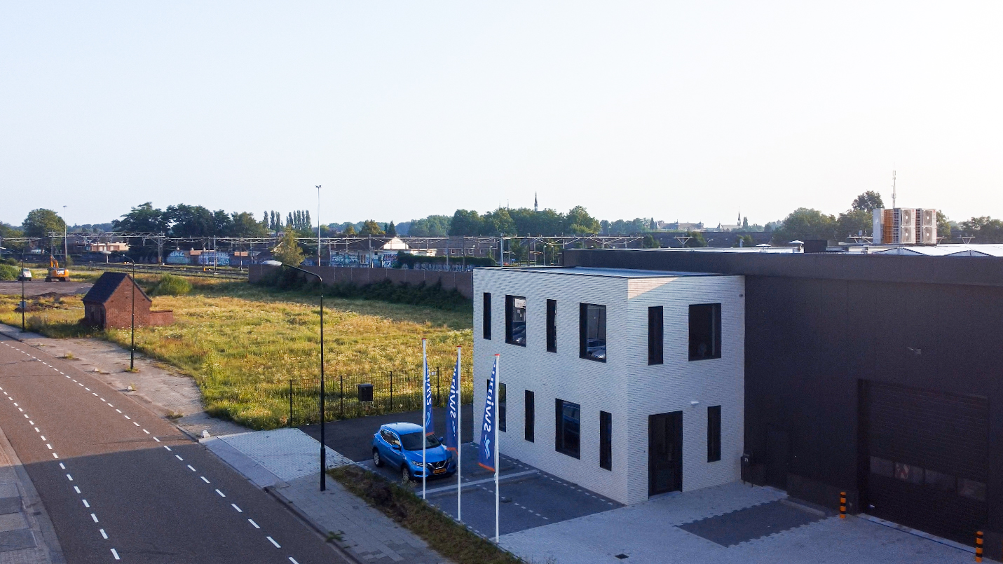SWIMM's nieuwe hoofdkwartier in Boxtel gezien vanuit de lucht.